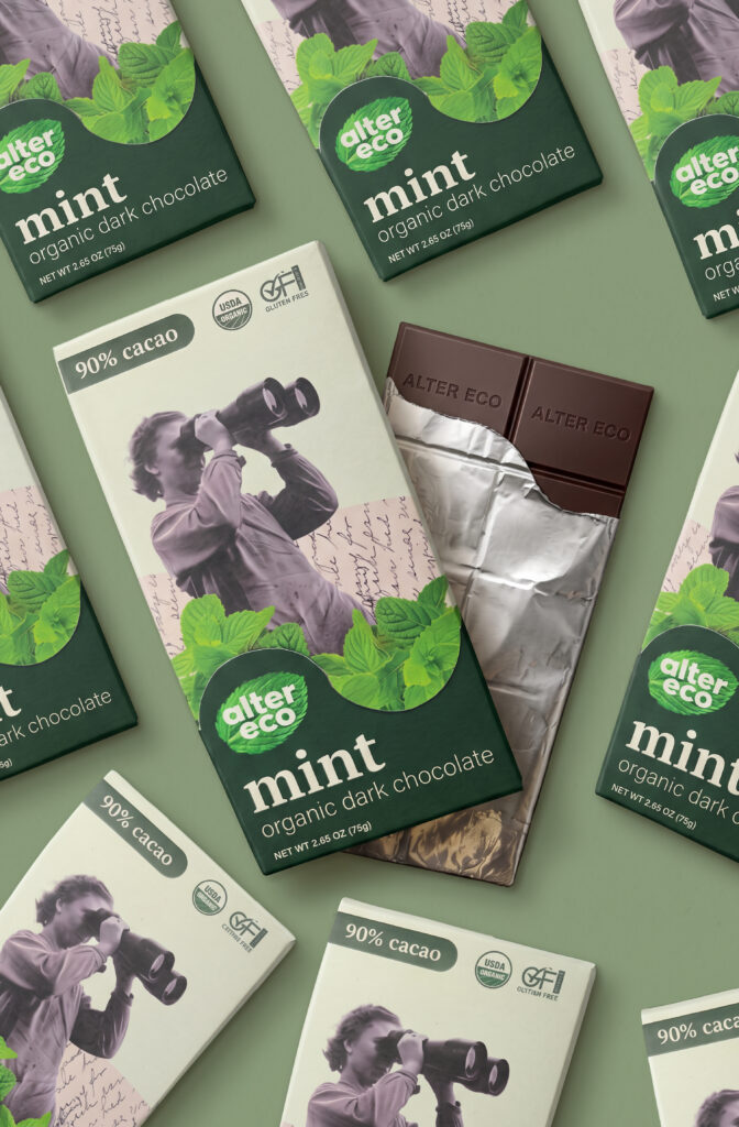 Flat lay composition of Alter Eco mint chocolate bars with mint leaves and chocolate pieces on a green background.